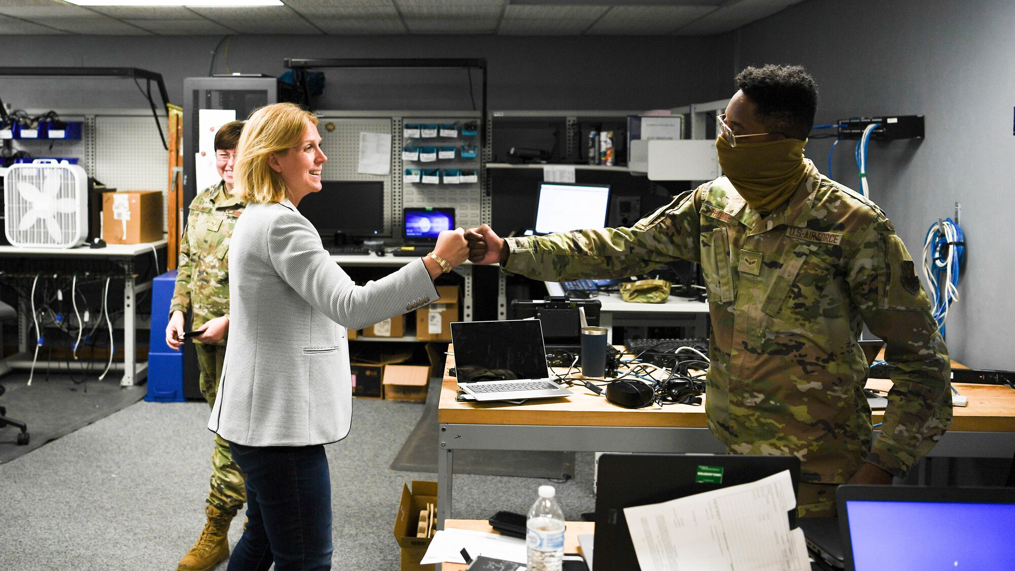 Lauren Barrett Knausenberger, Air Force chief information officer, receives a mission brief from the 2nd Communications Squadron during an official visit to Barksdale Air Force Base, Louisiana, June 16, 2021. During her visit, Knausenberger interacted with Airmen from across Air Force Global Strike Command and familiarized herself with their role in the mission. (U.S. Air Force photo by Senior Airman Jacob B. Wrightsman)