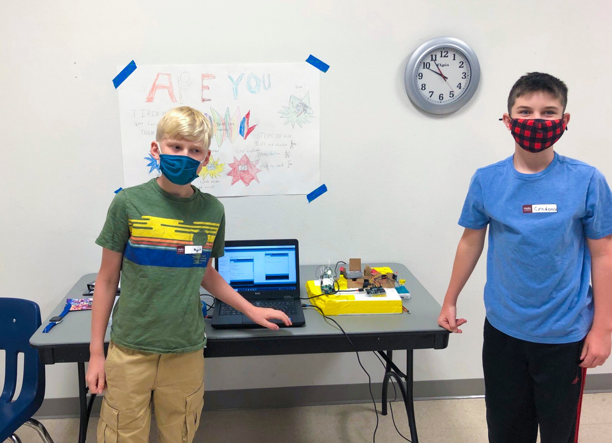 A group of students from the Science, Technology, Engineering, and Mathematics Innovation Camp present their invention in front of a panel of judges, June 18, 2021, on Holloman Air Force Base, New Mexico. Each student received a certificate as well as a circuit board to use for future projects, provided by the U.S. Air Force Research Lab. (Courtesy photo)