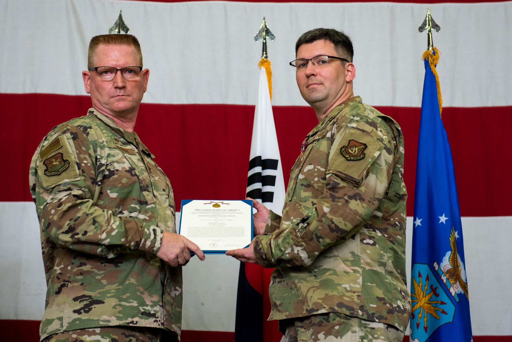 51st Maintenance Squadron held a change of command ceremony at Osan Air Base, Republic of Korea, June 18, 2021. Lt. Col. Robert Campbell transferred command of the 51st MXS to Maj. Benjamin Abshire.