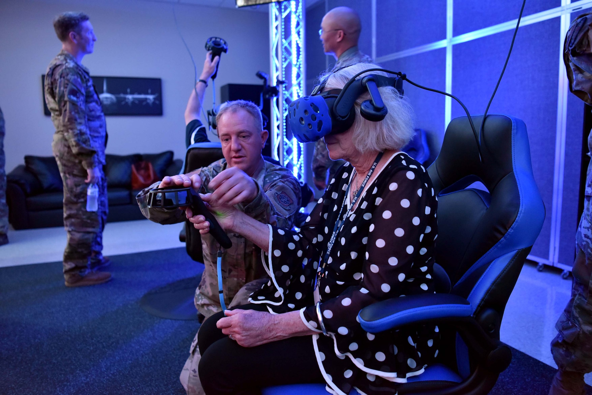 Yvonne Batts, Air Mobility Command Civic Leader representing Dyess Air Force Base, Texas, tours the virtual reality maintenance hangar