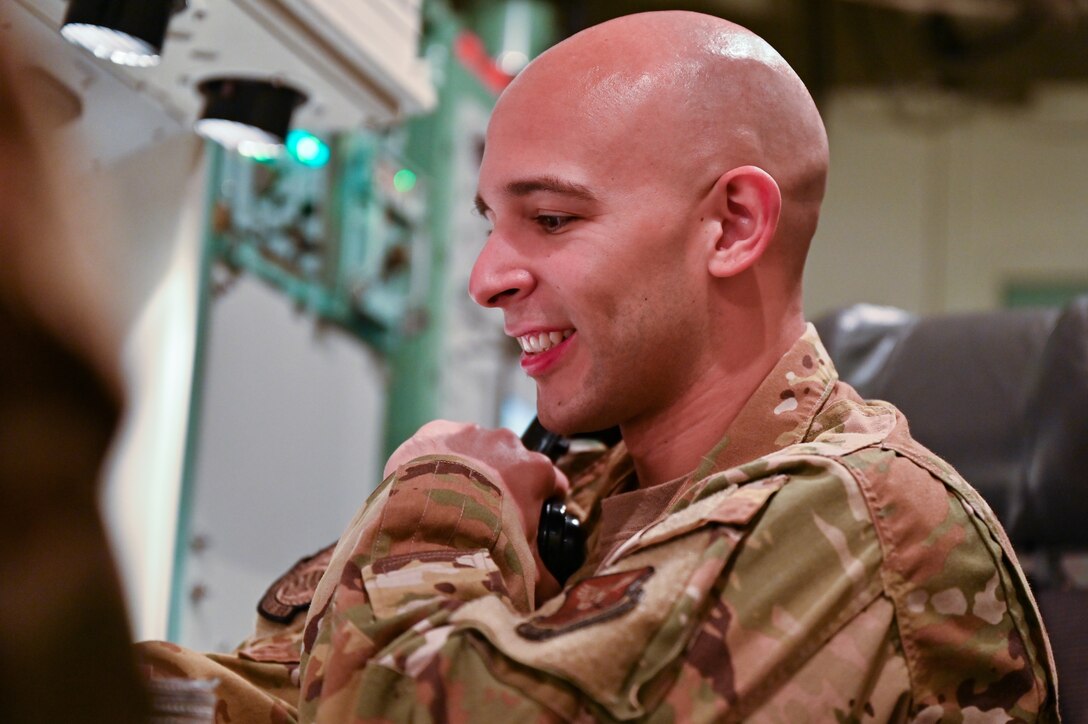 1st Lt. Juan Navarro, 321st Missile Squadron, runs an emergency checklist during training in the Missile Procedures Trainer on F.E. Warren Air Force Base, Wyoming, June 17, 2021. The Air Force Association awarded Heath and Navarro the 2020 Gen. Thomas S. Power Outstanding Missile Crew Award. (U.S. Air Force photo by Joseph Coslett)