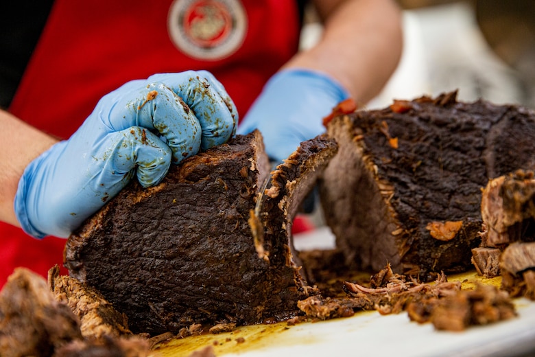 U.S. Marine Corps Sgt. Jordan James, a food service specialist with Headquarters and Support Battalion, Marine Corps Installations Pacific, prepares food during the food service specialist of the quarter competition on Camp Kinser, Okinawa, Japan, June 16, 2021. The two-day competition began with a written and oral examination where Marines are judged on their military appearance, knowledge, and bearing. The second portion of the event focused on the Marines’ culinary, sanitation and nutritionary skills while under the watchful eye of quality assurance evaluators. James is a native of Winslow, Arizona. (U.S. Marine Corps photo by Lance Cpl. Alex Fairchild)
