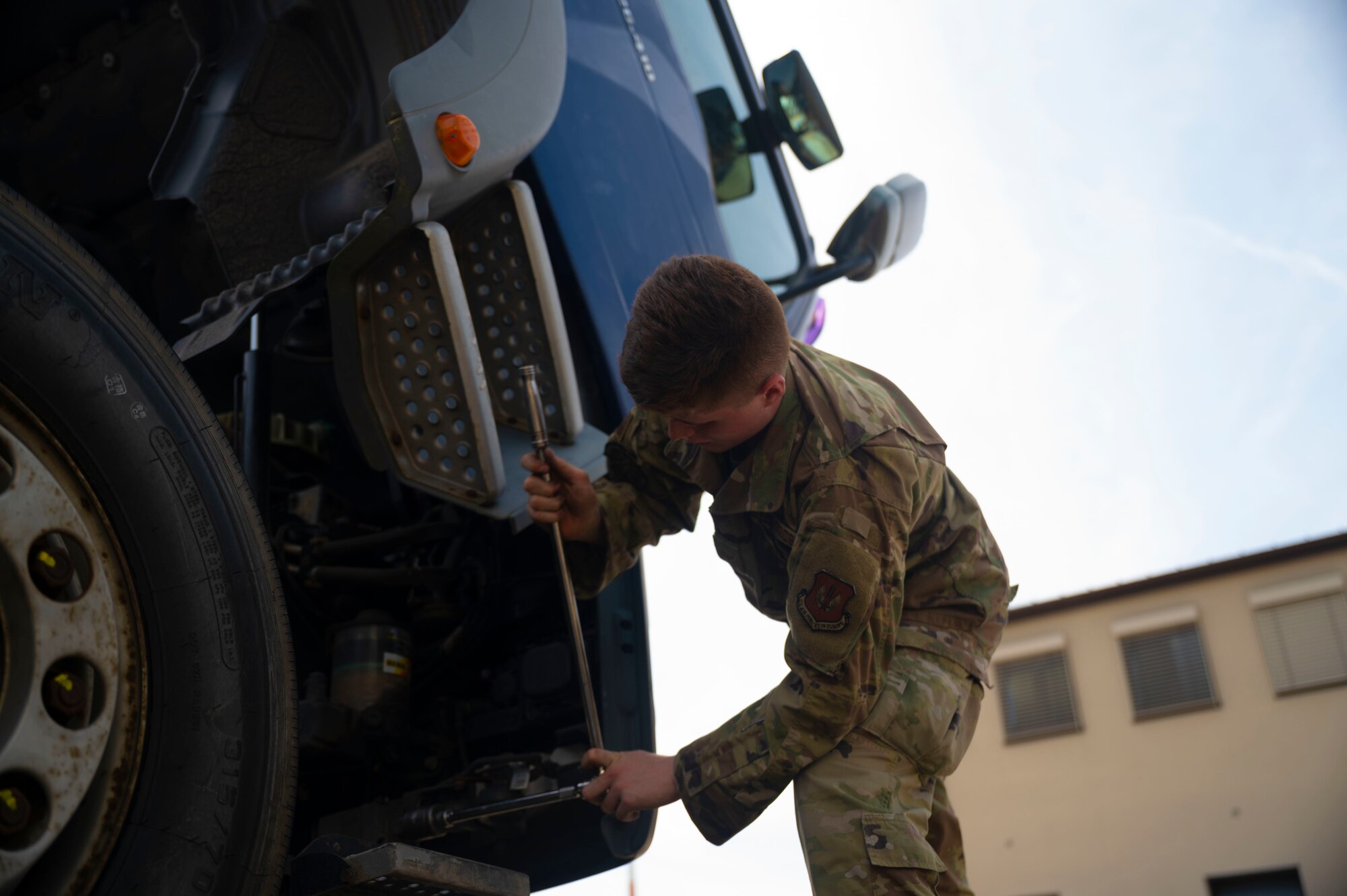 U.S. Air Force Airman 1st Class Dylan Mahon, 86th Vehicle Readiness Squadron vehicle maintenance apprentice, inspects a tractor-trailer