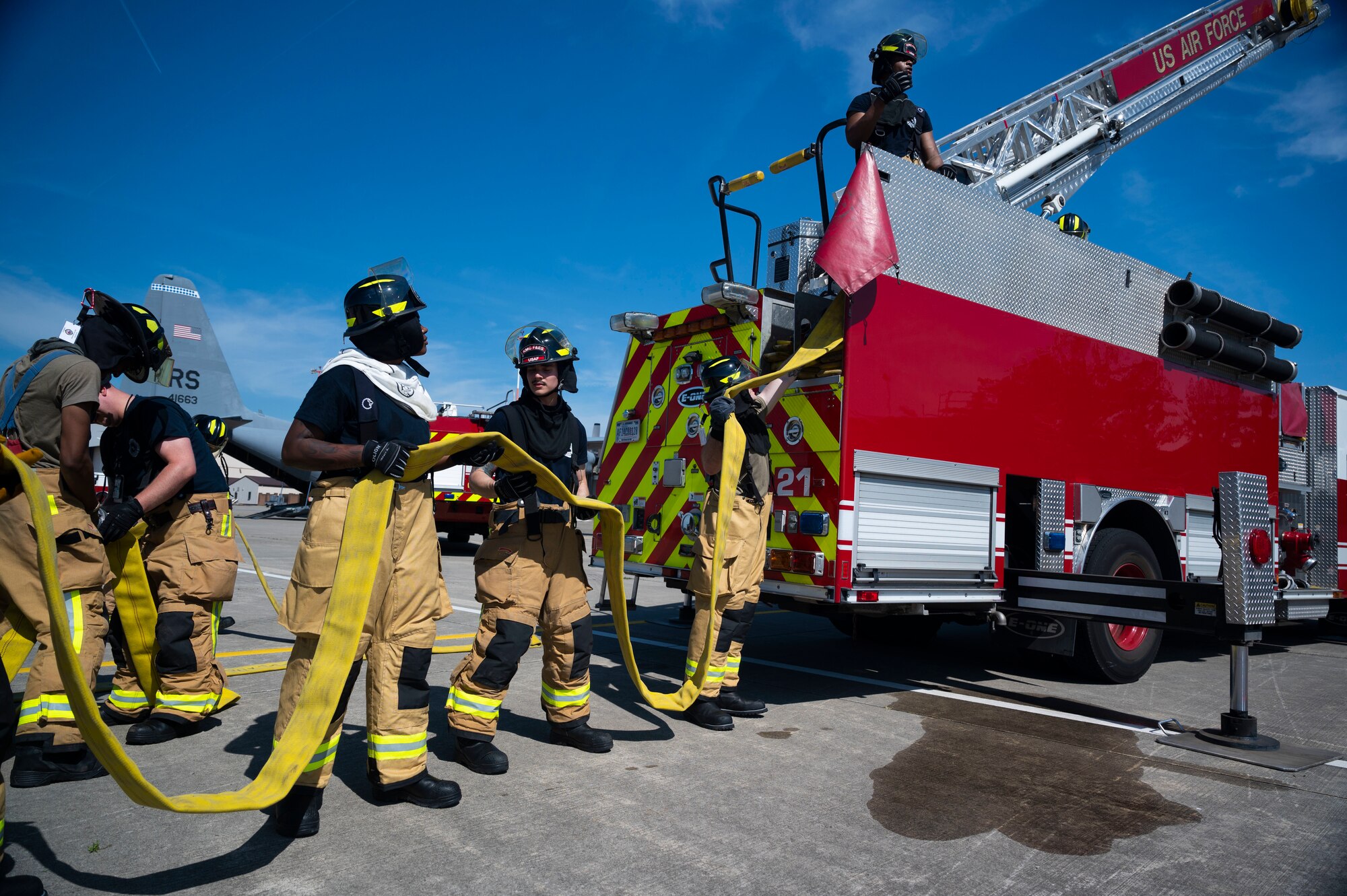 U.S. Air Force firefighters assigned to the 86th Civil Engineer Squadron conduct aircraft fire training exercises