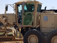 Engineers improve access road at WAREX 86-21-02