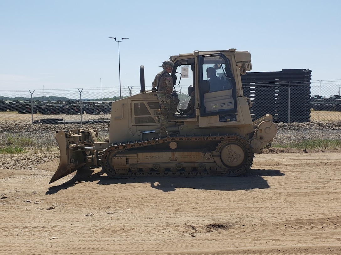 Engineers improve access road at WAREX 86-21-02