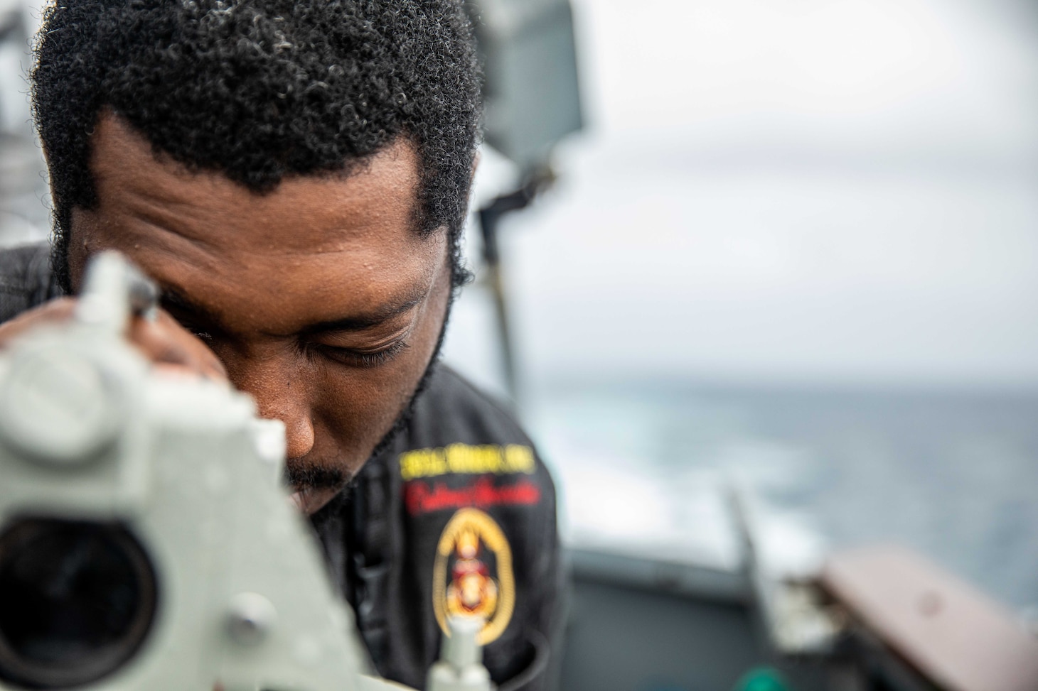 TAIWAN STRAIT (June 22, 2021) – Culinary Specialist 3rd Class Curtis Lynch, from Petersburg, Va., stands watch on the bridge wing of Arleigh Burke-class guided-missile destroyer USS Curtis Wilbur (DDG 54) as the ship conducts routine operations. Curtis Wilbur is assigned to Commander, Task Force 71/Destroyer Squadron (DESRON) 15, the Navy’s largest forward-deployed DESRON and U.S. 7th Fleet’s principal surface force.