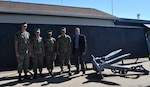 IMAGE: Midshipmen Aidan Leavy, Zach Shieh, Sydney Means and Lian Dunlevy pose for a group photo outside the Potomac River Test Range with Naval Surface Warfare Center (NSWC) Indian Head Scientific and Technical Intelligence Liaison Officer Kenneth Conley. The midshipmen visited NSWC Dahlgren on June 17 to tour facilities and hear briefs on hypersonics, the battle management system and Dahlgren’s role in supporting the warfighter.