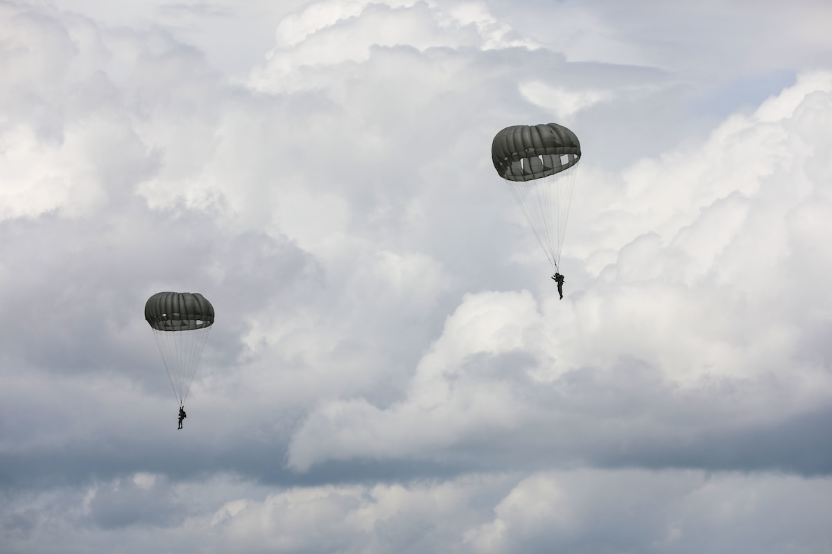 Soldiers conduct parachute jump training in Guyana.