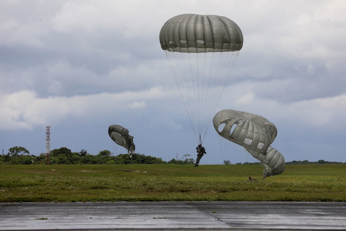 Soldiers conduct parachute jump training in Guyana.