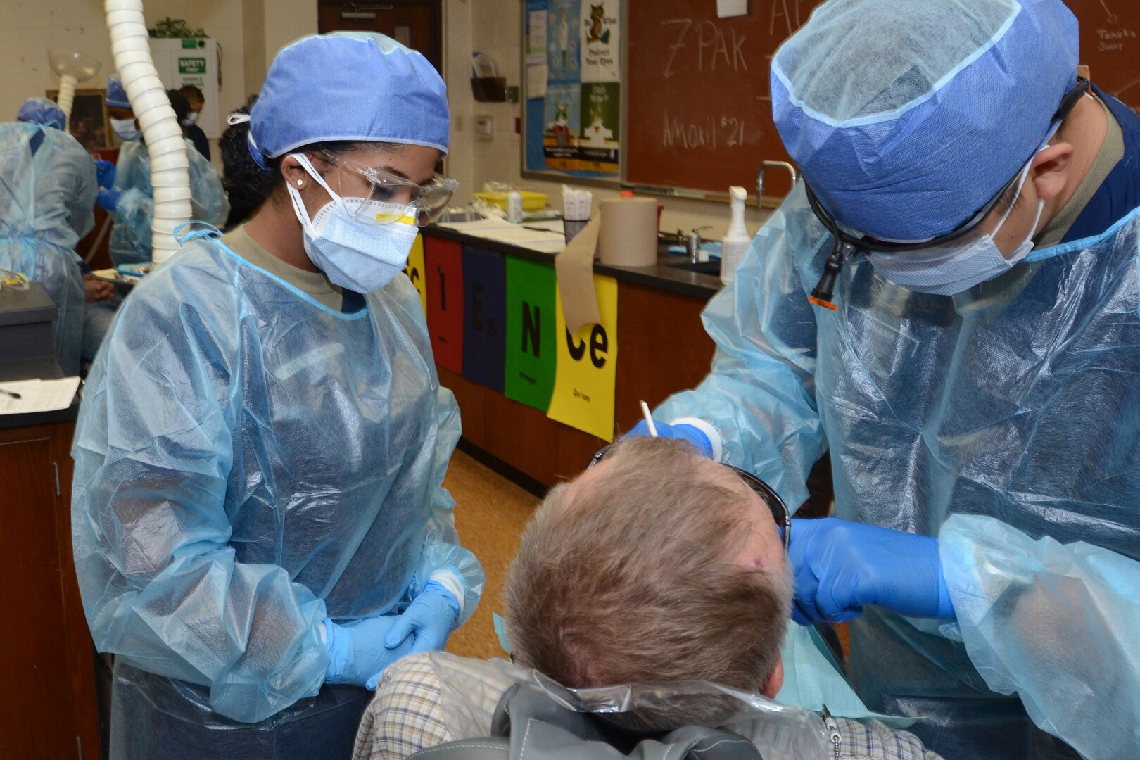 South Carolina Air National Guard Airman 1st Class Destiny Sims, left, 169th Fighter Wing, McEntire Joint National Guard Base, helps provide free dental care in Metropolis, Illinois, June 16, 2021. Operation Healthy Delta is a Department of Defense Innovative Readiness Training program that provides key services in underserved communities while offering training for military personnel.