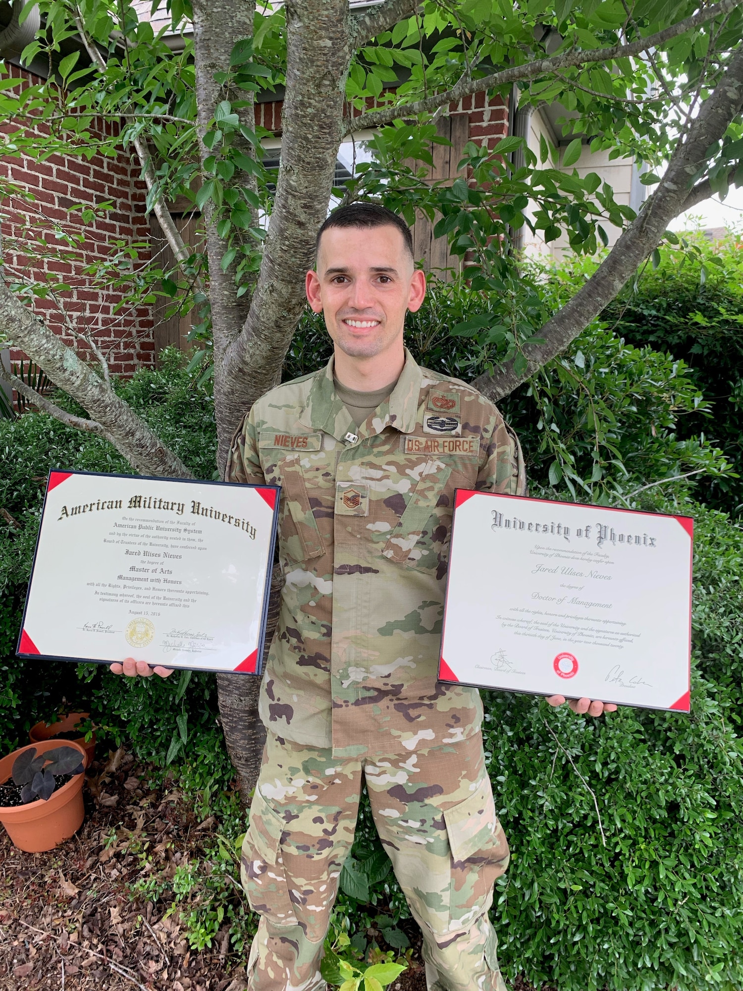 MSgt Jared Nieves Displays Diplomas