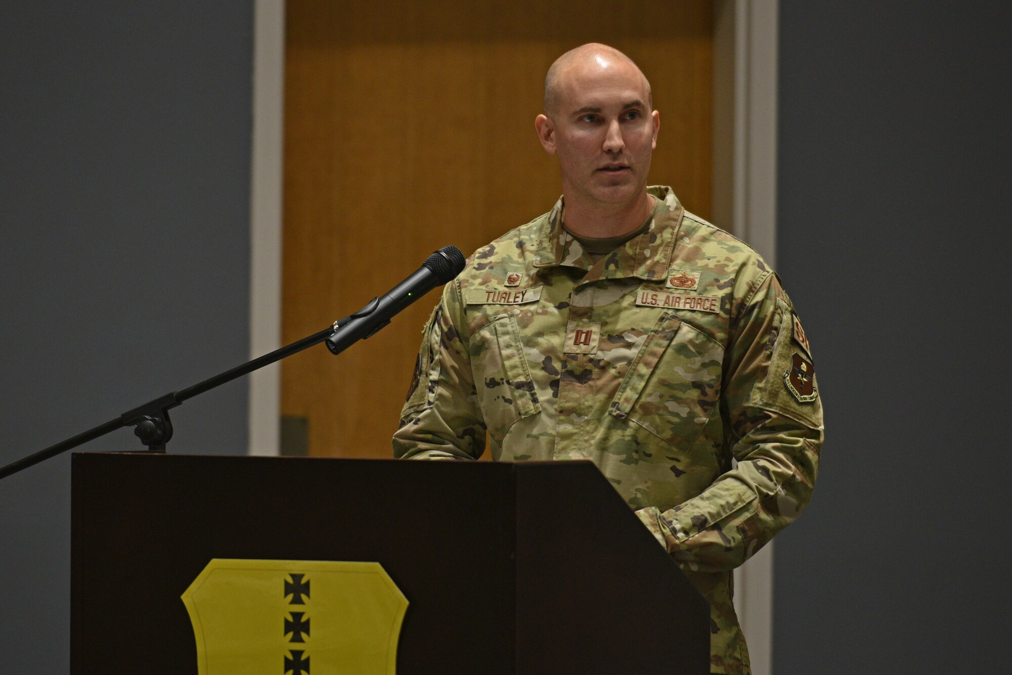 U.S. Air Force Capt. Heath Turley, incoming 17th Security Forces Squadron commander, speaks during the change of command ceremony at the Event Center on Goodfellow Air Force Base, Texas, June 22, 2021. The 17th SFS provides unparalleled base defense and law enforcement services to Goodfellow AFB, and supports contingency operations with world class defenders. (U.S. Air Force photo by Senior Airman Ashley Thrash)