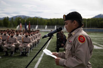 Alaska Military Youth Academy Cadet Naomi Goodloe, honor graduate, addresses the graduating cadets at AMYA's graduation ceremony, held at the Bartlett High School Football Field in Anchorage, June 18, 2021. The ceremony featured Alaska Lt. Gov. Kevin Meyer as the keynote speaker for the 79 graduating cadets and their families. (U.S Army National Guard photo by Victoria Granado)
