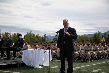 David McPhetres, director of the Alaska Military Youth academy makes opening remarks at AMYA's graduation ceremony, held at the Bartlett High School Football Field in Anchorage, June 18, 2021. The ceremony featured Alaska Lt. Gov. Kevin Meyer as the keynote speaker for the 79 graduating cadets and their families. (U.S Army National Guard photo by Victoria Granado)