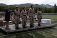 Alaska Military Youth Academy cadets stand for applause after receiving awards at AMYA's graduation ceremony, held at the Bartlett High School Football Field in Anchorage, June 18, 2021. The ceremony featured Alaska Lt. Gov. Kevin Meyer as the keynote speaker for the 79 graduating cadets and their families. (U.S Army National Guard photo by Victoria Granado)