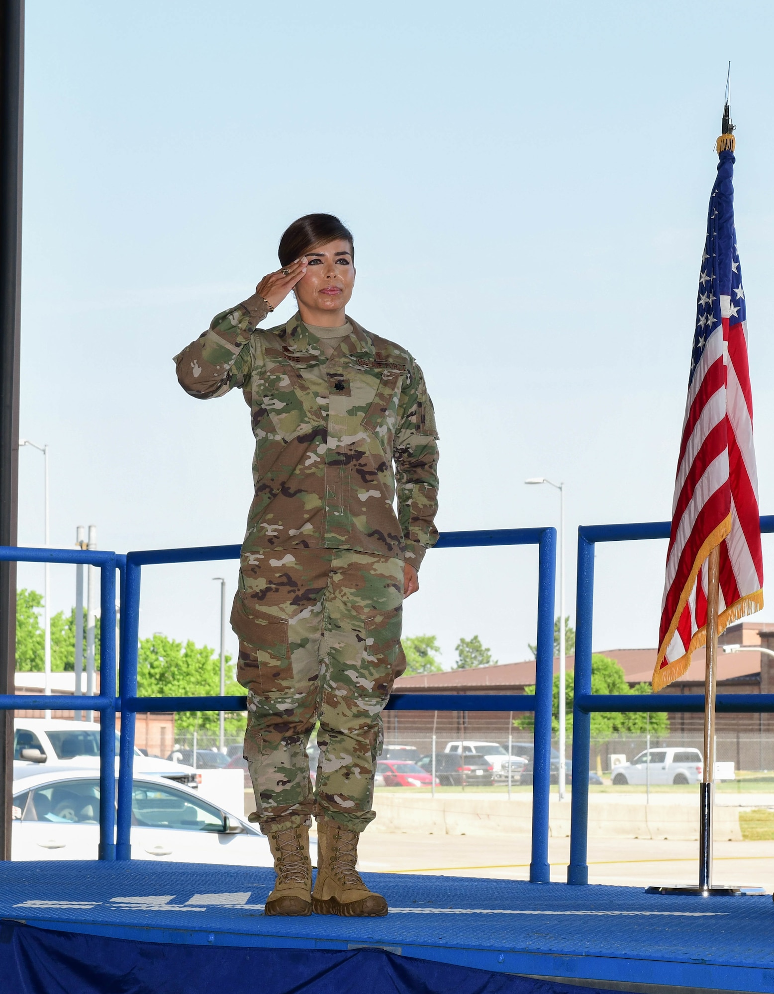 During the ceremony, Col. Mark Reynolds, 509th Medical Group commander, passed the unit flag to Lt. Col. Jessica Dees as a symbol of the continuity of authority between the outgoing and incoming commanders. (U.S. Air Force photo by Tech. Sgt. Heather Salazar)