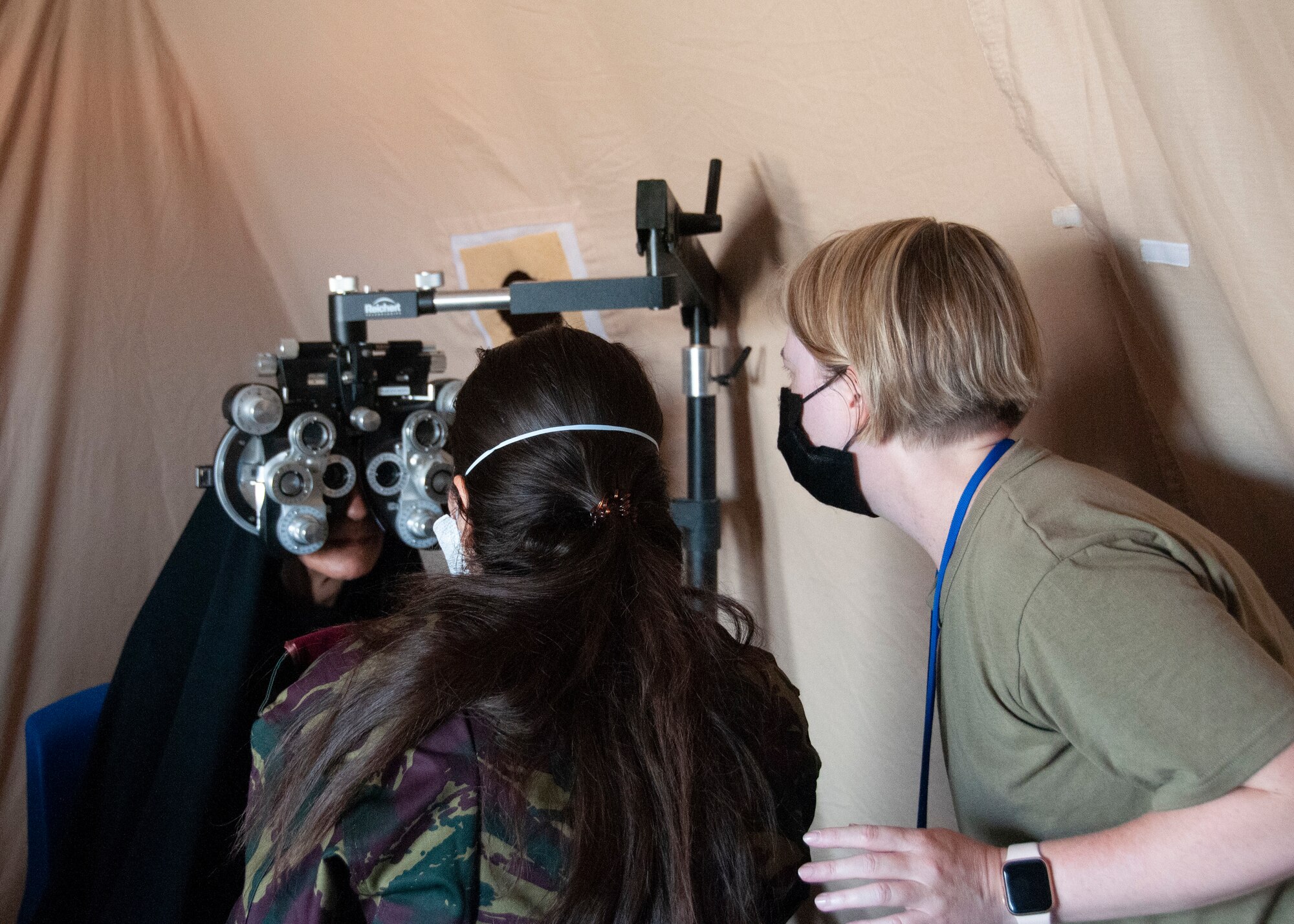 U.S. Military members conduct medical treatment on Moroccan civilians.