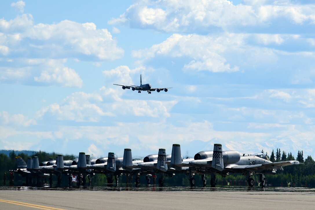 F-16 Fighting Falcons assigned to the 8th Fighter Wing, Kunsan Air Base, Republic of Korea, and A-10 Thunderbolt II's assigned to the 25th Fighter Squadron, Osan Air Base, Republic of Korea, wait for takeoff during Red Flag-Alaska 21-2 at Eielson Air Force Base, Alaska, June 16, 2021. This exercise provides unique opportunities to integrate various forces into joint and multilateral training from simulated forward operating bases. (U.S. Air Force photo by Senior Airman Suzie Plotnikov)