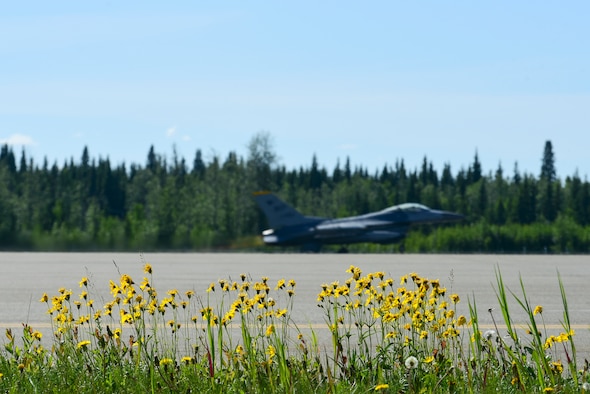 An F-16 Fighting Falcon takes off during Red Flag-Alaska 21-2 at Eielson Air Force Base, Alaska, June 16, 2021. RF-A is a Pacific Air Forces-directed field training exercise designed to provide U.S. and allied forces realistic air combat training for which enhances joint and bilateral interoperability in the Indo-Pacific region. (U.S. Air Force photo by Senior Airman Suzie Plotnikov)