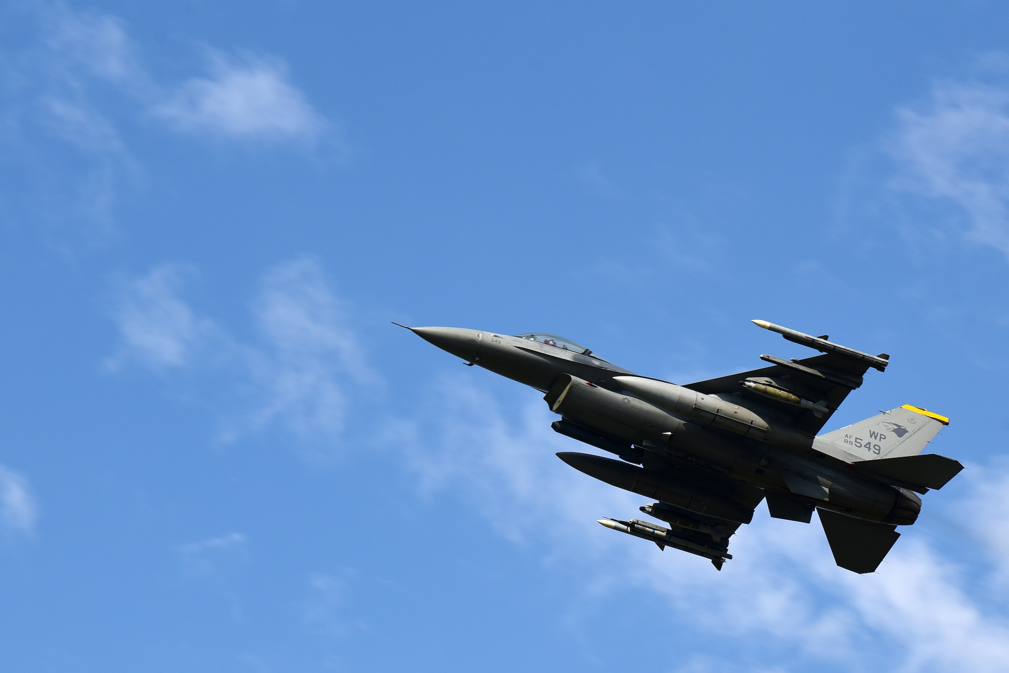 An F-16 Fighting Falcon flies over Eielson Air Force Base, Alaska, during Red Flag-Alaska 21-2 at Eielson AFB, Alaska, June 17, 2021. RF-A reinforces the United States' continued commitment to the region as a Paciic nation, leader and power. (U.S. Air Force photo by Senior Airman Suzie Plotnikov)