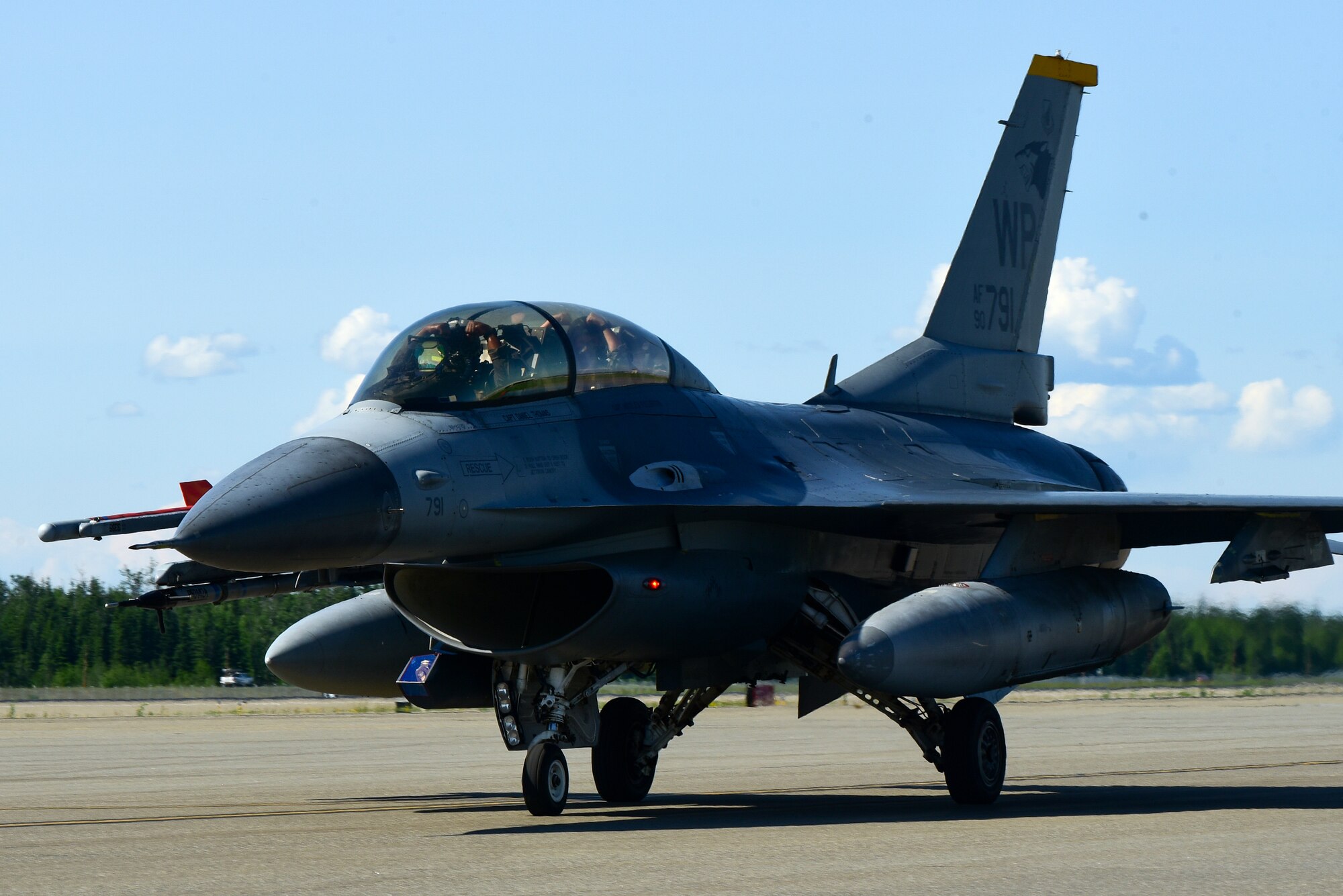 An F-16 Fighting Falcon taxis before takeoff during Red Flag-Alaska 21-2 at Eielson Air Force Base, Alaska, June 16, 2021. RF-A exercises are focused on improving the combat readiness of U.S. and international forces and providing training for units preparing for air and space expeditionary force tasking. (U.S. Air Force photo by Senior Airman Suzie Plotnikov)