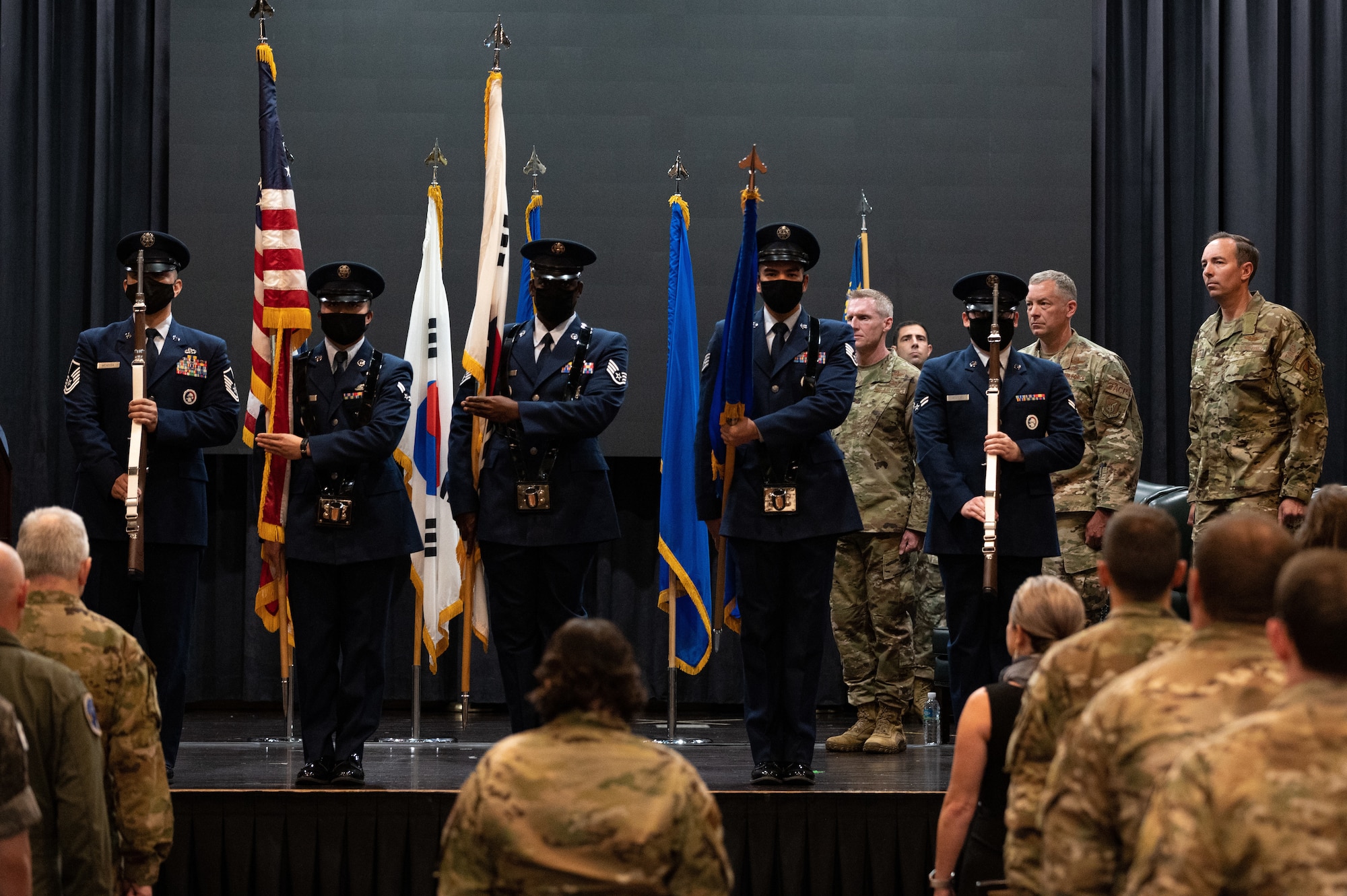 Osan Air Base honor guard performs colors at the 607th Air Support Operations Group change of command at Osan Air Base, Republic of Korea, June 22, 2021. The change of command ceremony is deeply rooted in military tradition that dates back to the reign of King Frederick of Prussia and has persisted into modern day. (U.S. Air Force photo by Tech. Sgt. Nicholas Alder)