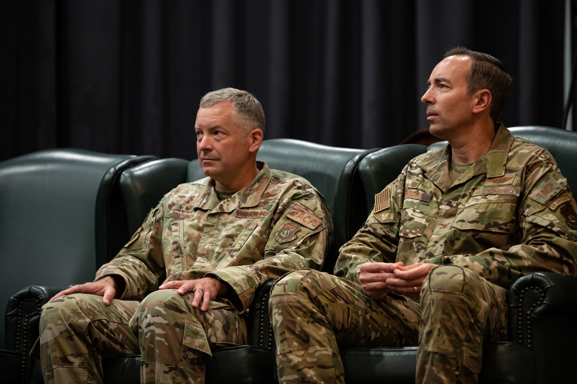 Col. William Edmunds, 607th Air Support Operations Group commander, left, and Col. Scott Morgan, 607th ASOG inbound commander, listen to remarks during the 607th ASOG change of command ceremony at Osan Air Base, Republic of Korea, June 22, 2021. Brig Gen. Jason Rueschhoff, 7th Air Force deputy commander, provided remarks as the Presiding Officer. (U.S. Air Force photo by Tech. Sgt. Nicholas Alder)