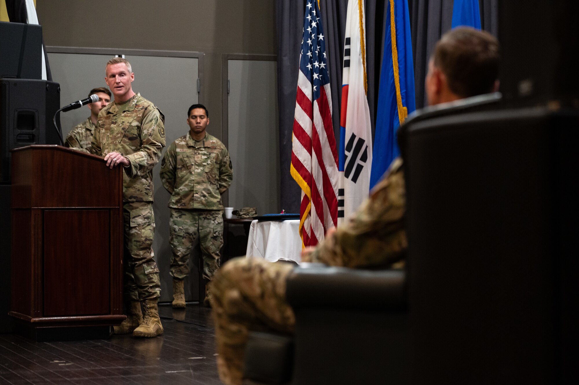 Brig. Gen. Jason Rueschhoff, 7th Air Force deputy commander, presides over the 607th Air Support Operations Group change of command ceremony at Osan Air Base, Republic of Korea, June 22, 2021. As the presiding officer, Rueschhoff facilitated the transition of 607th ASOG command by receiving the ceremonial guidon from the outgoing officer and presenting it to the incoming officer. (U.S. Air Force photo by Tech. Sgt. Nicholas Alder)