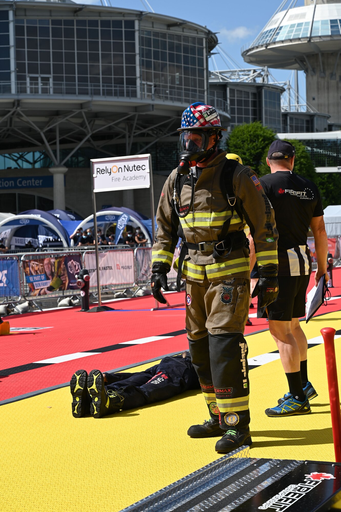 Master Sgt. Sean Sullivan, assistant chief of training in the 445th Civil Engineer Squadron, puts on his gear before competing in the FireFit Europe Championships June 20, 2021 in Hannover, Germany. Amid 400 contenders, Sullivan ranked first in the over-40 age category, and eighth overall. He travelled from Frankfort, Kentucky, to compete in the multiday event. (U.S. Air Force photo/Capt. Rachel Ingram)