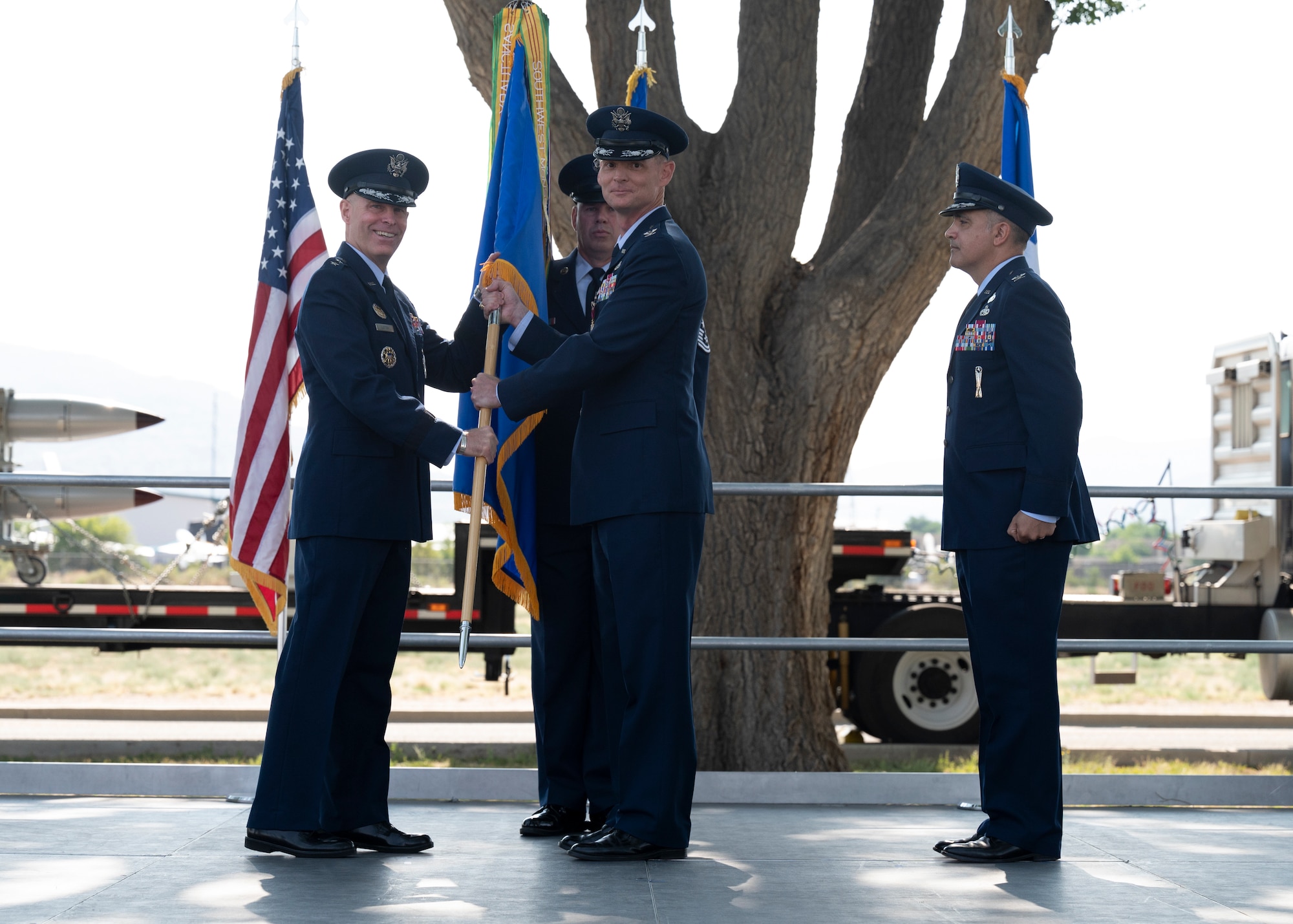 The ceremonial tradition of the passing of the guidon is conducted.