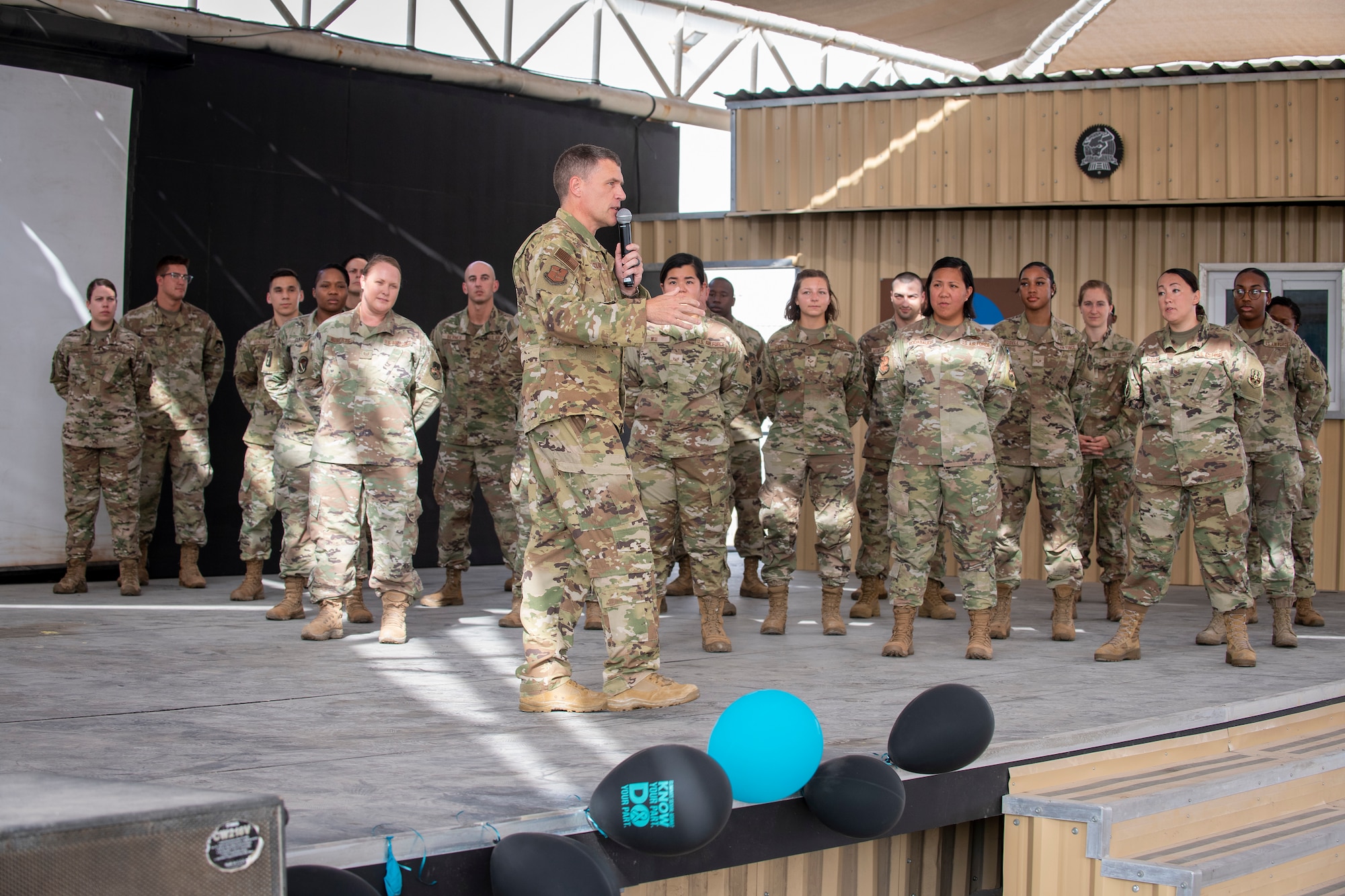 U.S. Air Force Brig. Gen. Andrew Clark, 380th Air Expeditionary Wing commander, administers an oath to the Teal Team 6 (TT6) volunteer members during the Sexual Assault Prevention and Response (SAPR), TT6 induction ceremony at Al Dhafra Air Base (ADAB) United Arab Emirates, June 18, 2021. TT6 members, take an oath to uphold a code of ethics, promote mutual respect, to support others and promise to improve the culture around them.