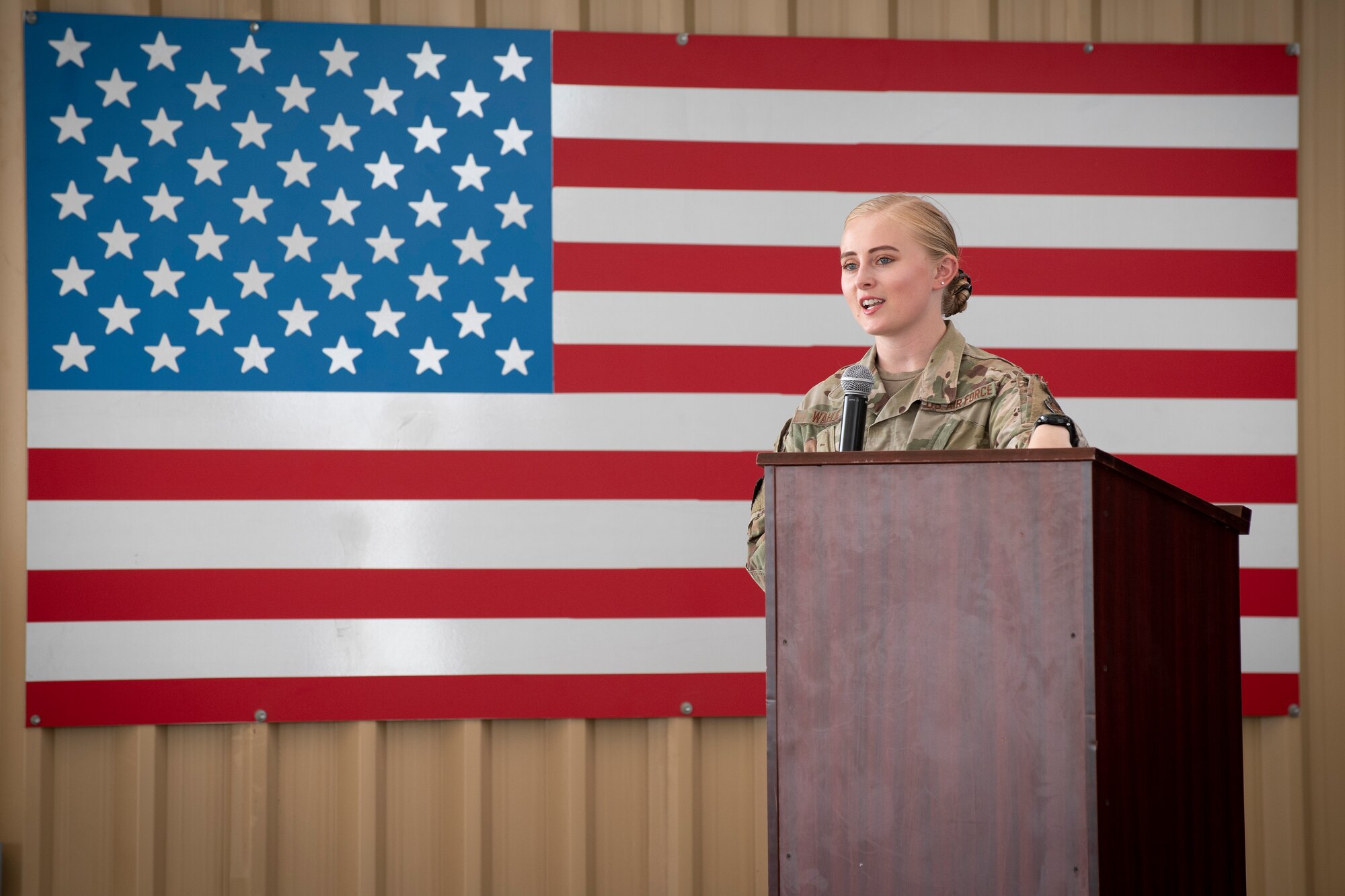 U.S. Air Force Brig. Gen. Andrew Clark, 380th Air Expeditionary Wing commander, administers an oath to the Teal Team 6 (TT6) volunteer members during the Sexual Assault Prevention and Response (SAPR), TT6 induction ceremony at Al Dhafra Air Base (ADAB) United Arab Emirates, June 18, 2021. TT6 members, take an oath to uphold a code of ethics, promote mutual respect, to support others and promise to improve the culture around them.