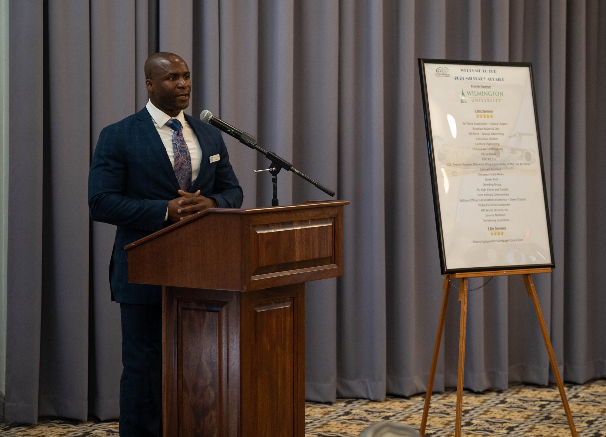 Evans Armantrading, Central Delaware Chamber of Commerce vice chair of military affairs, speaks during the Military Affaire event at Dover Air Force Base, Delaware, June 17, 2021. The annual event brings Dover AFB and community leaders together to network and build relationships. (U.S. Air Force photo by Senior Airman Faith Schaefer)