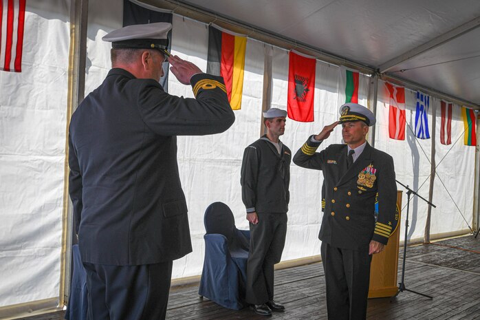 KIEL, Germany (June 19, 2021) Cmdr. Jan Wijchers, Royal Netherlands Navy, is relieved by Capt. Sam P. Brasfield as commanding officer of Standing NATO Mine Countermeasures Group One (SNMCMG1), aboard the Blue Ridge-class command and control ship USS Mount Whitney (LCC 20), during the change of command ceremony, June 19, 2021 after exercise BALTOPS 50. Brasfield is the first U.S. commander to command a SNMCM. SNMCMGs provides Allied Maritime Command with constant MCM capabilities to ensure safe and secure sea lanes of communication.