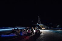 Over-snow reconnaissance vehicles and sleds being loaded onto a C-130 in preparation for deep precision strike operations during COLD RESPONSE 20 in Bardufoss, Norway. Photo by Staff Sgt. Devin Boyer.