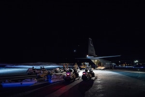 Over-snow reconnaissance vehicles and sleds being loaded onto a C-130 in preparation for deep precision strike operations during COLD RESPONSE 20 in Bardufoss, Norway. Photo by Staff Sgt. Devin Boyer.