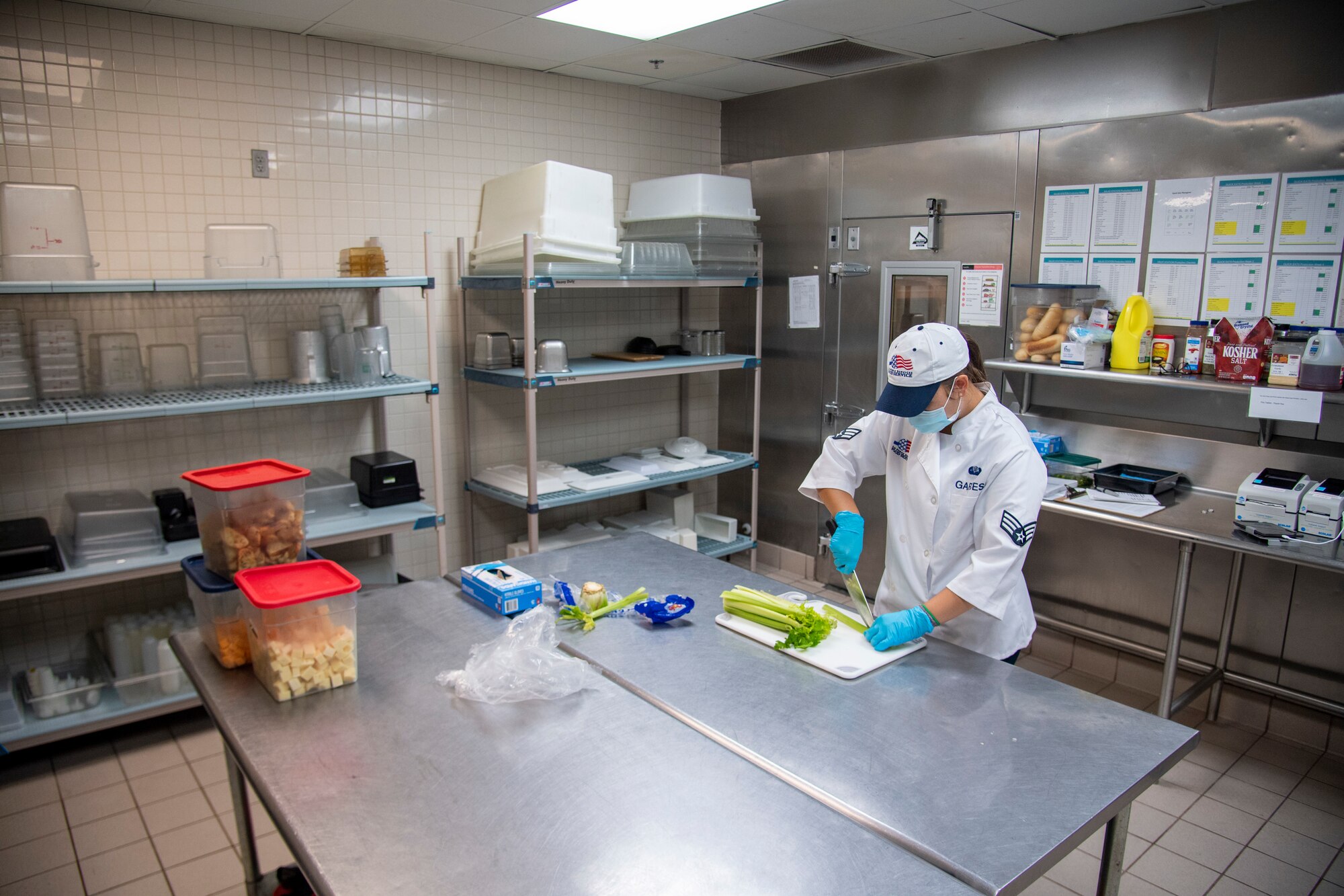 U.S. Air Force Senior Airman Haley Garces, 6th Force Support Squadron food services journeyman, prepares food for service members at MacDill Air Force Base, Florida, June 15, 2021.