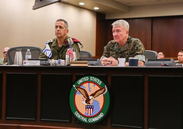 U.S. Marine Corps Gen. Kenneth F. McKenzie, commander of U.S. Central Command (CENTCOM), right, and Lt. Gen. Aviv Kohavi, Israel Defense Forces Chief of General Staff, left, attend a briefing at U.S. Central Command headquarters, June 22, 2021. During Kohavi’s visit the leaders discussed a range of issues, such as the situation in the West Bank, Jerusalem and Gaza, the current security challenges emanating from the Middle East and the ongoing effort to realign Israel from U.S. European Command to CENTCOM. McKenzie and Kohavi agreed that the realignment will help broaden the bilateral and multilateral relationships that already exist between Israel, Gulf nations and the United States. (U.S. Central Command Public Affairs photo by Tom Gagnier)