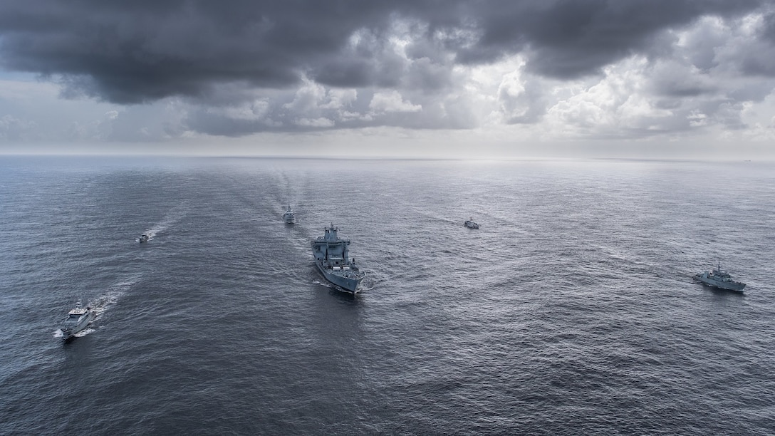 Multinational vessels participating in exercise Tradewinds 2021 conduct a photo exercise (PHOTEX) off the coast of Guyana June 18 2021.