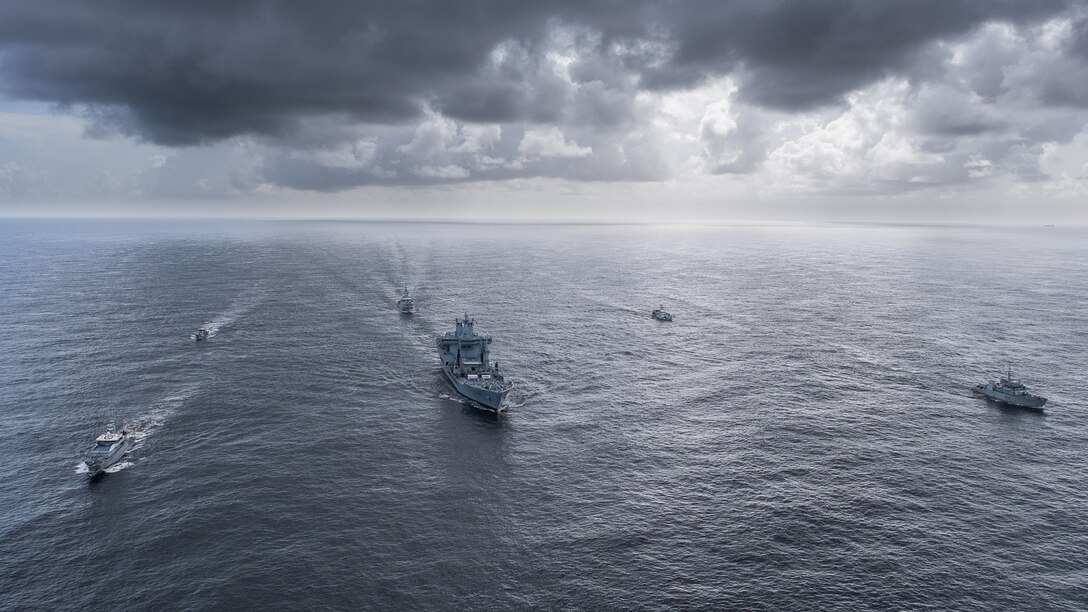 Multinational vessels participating in exercise Tradewinds 2021 conduct a photo exercise (PHOTEX) off the coast of Guyana June 18 2021.