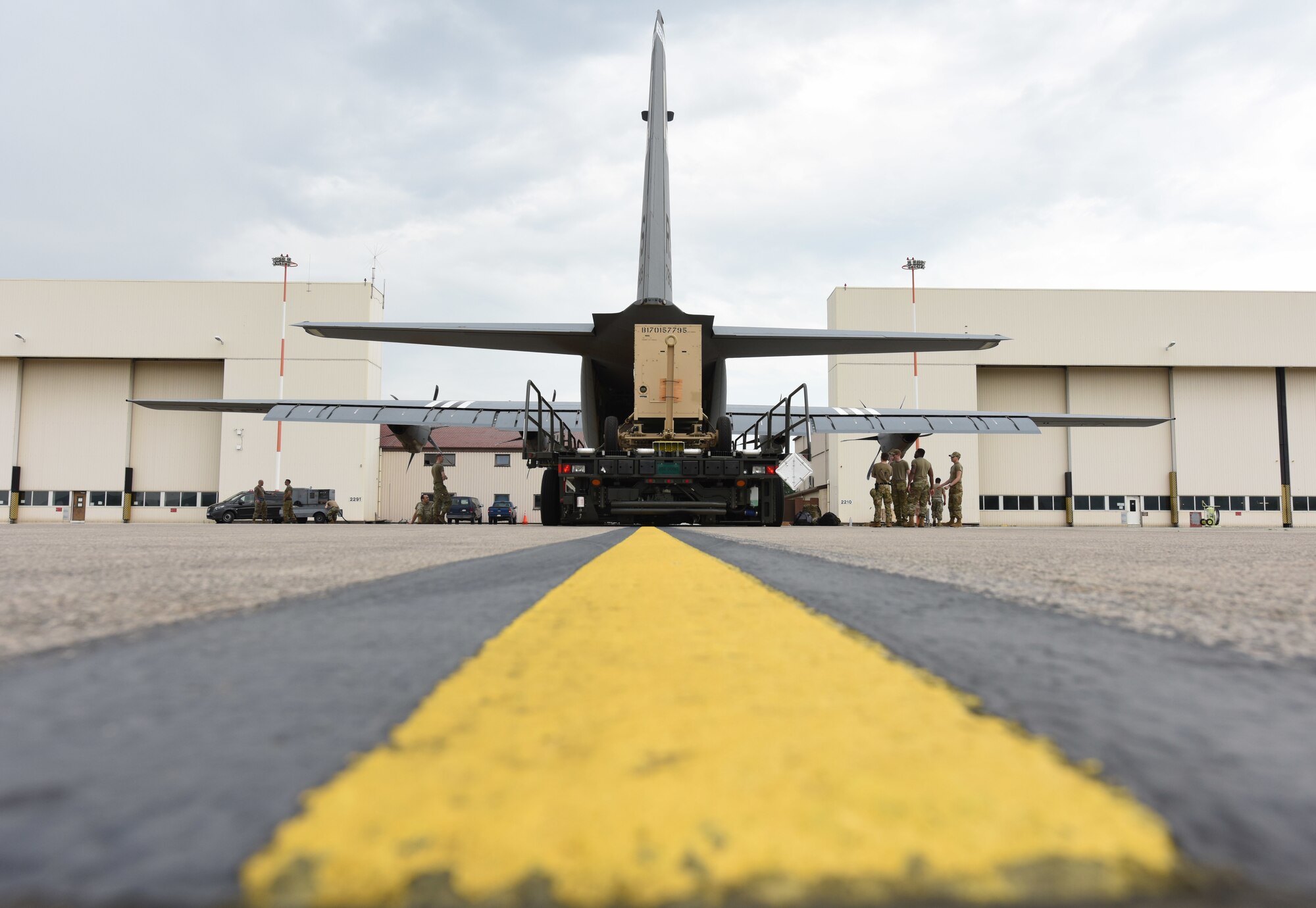 Airmen load C-130J Super Hercules aircraft with supplies at Ramstein Air Base, Germany, June 18, 2021. The 721st Aerial Port Squadron's special handling flight ensures cargo is loaded onto aircraft to be sent to warfighters downrange worldwide. (U.S. Air Force photo by Senior Airman Thomas Karol)