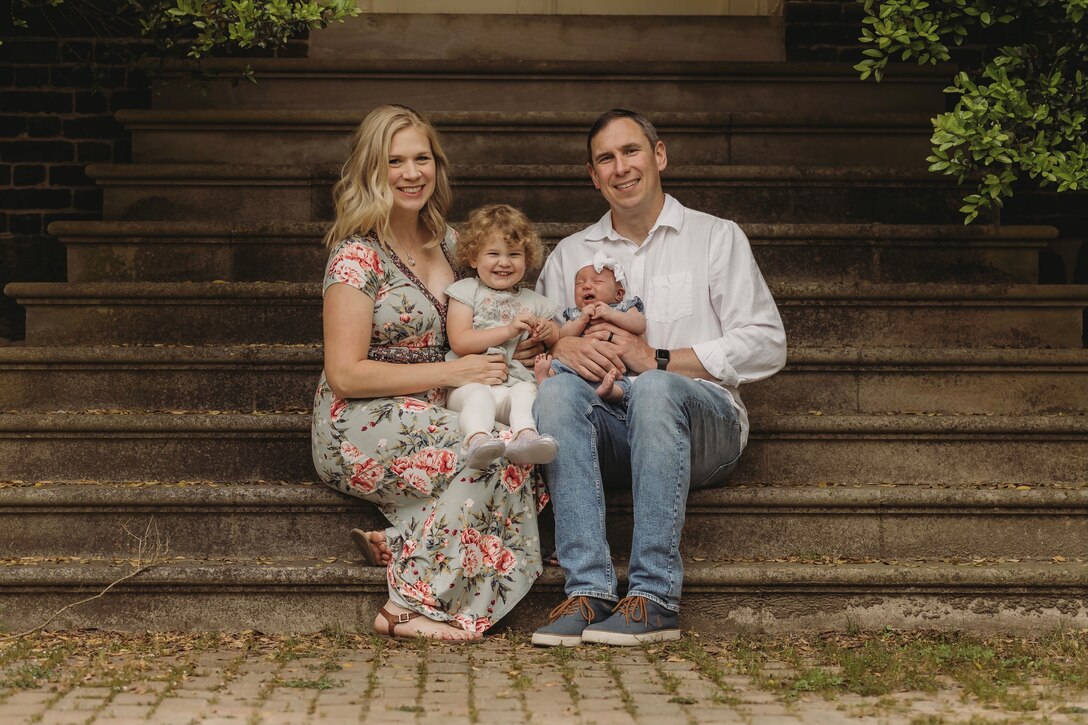 U.S. Air Force Lt. Col. Brian Campbell, 633rd Logistics Readiness Squadron commander, and his wife Kat Campbell, pose for a photo with their daughters, Alexandra and Olivia. The couple told their personal story of resiliency, and talked about the importance of faith and a good support system. (Courtesy photo)