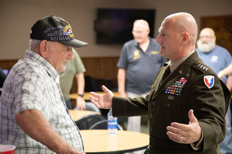 Gen. Ed Daly, commander Army Materiel Command, talks with Korean War veteran Pat Liddy during his visit to the Veterans of Foreign Wars Post 3377 in Manchaca, Texas, June 12.