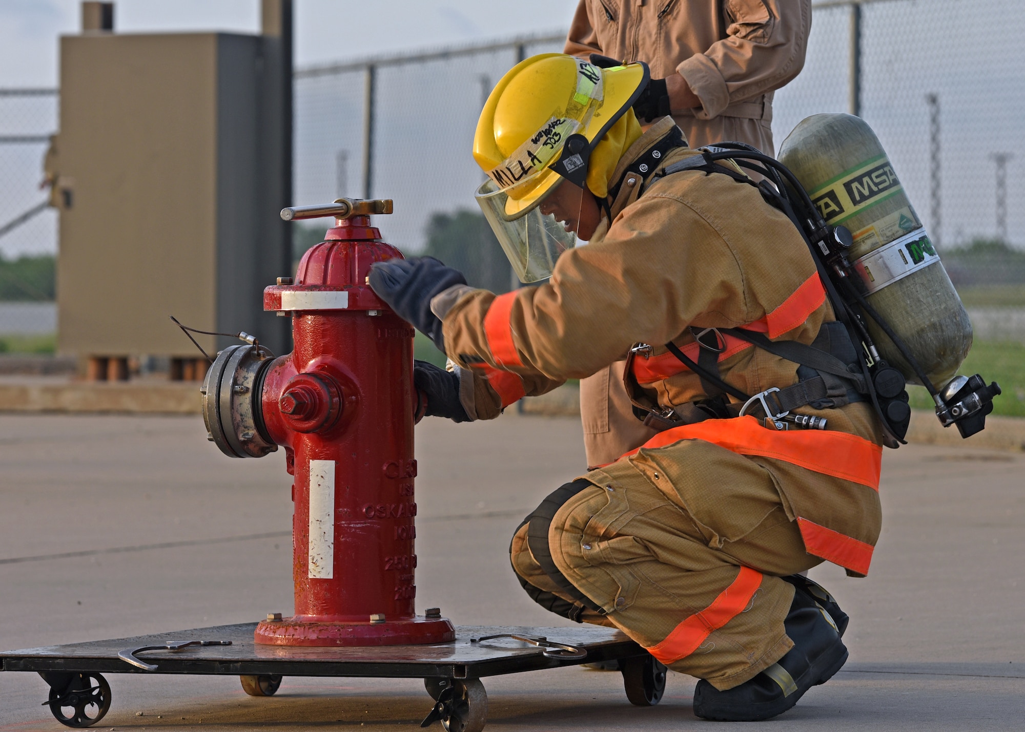Fire academy students train strength, endurance with hose pulls