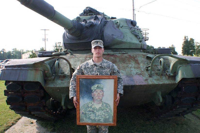 Staff Sgt. Thomas Clemons at the unit's armory in Leitchfield, Ky., June, 8, 2014. Clemons enlisted into the same unit his father served in before his death in Iraq in 2006.