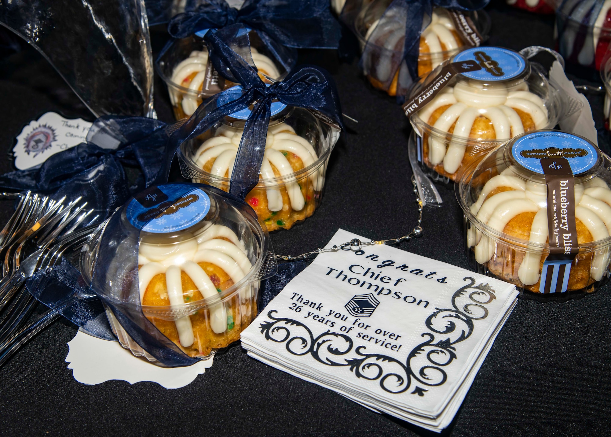 Desserts decorate a table during a retirement ceremony for Chief Master Sgt. Gary Thompson at Dover Air Force Base, Delaware, June 18, 2021. The ceremony paid special tribute to Thompson's distinguished career spanning 26 years. (U.S. Air Force photo by Airman 1st Class Stephani Barge)