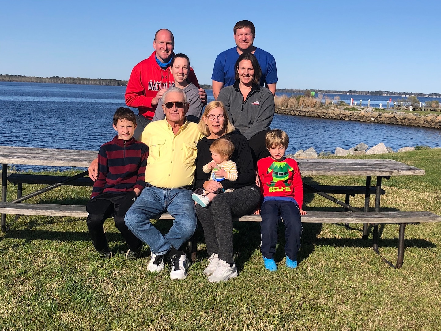 Cmdr. Morgan Holden with her husband Lt. Dave Holden pose with family during their vacation at Base Elizabeth City, North Carolina.