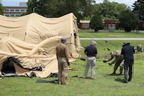 JOINT BASE LANGLEY-EUSTIS, Va. (June 23, 2021) Joint Task Force Civil Support incident support team personnel inflate an airbeam shelter during Exercise Lightning Response on Fort Eustis, Virginia, June 23, 2021.