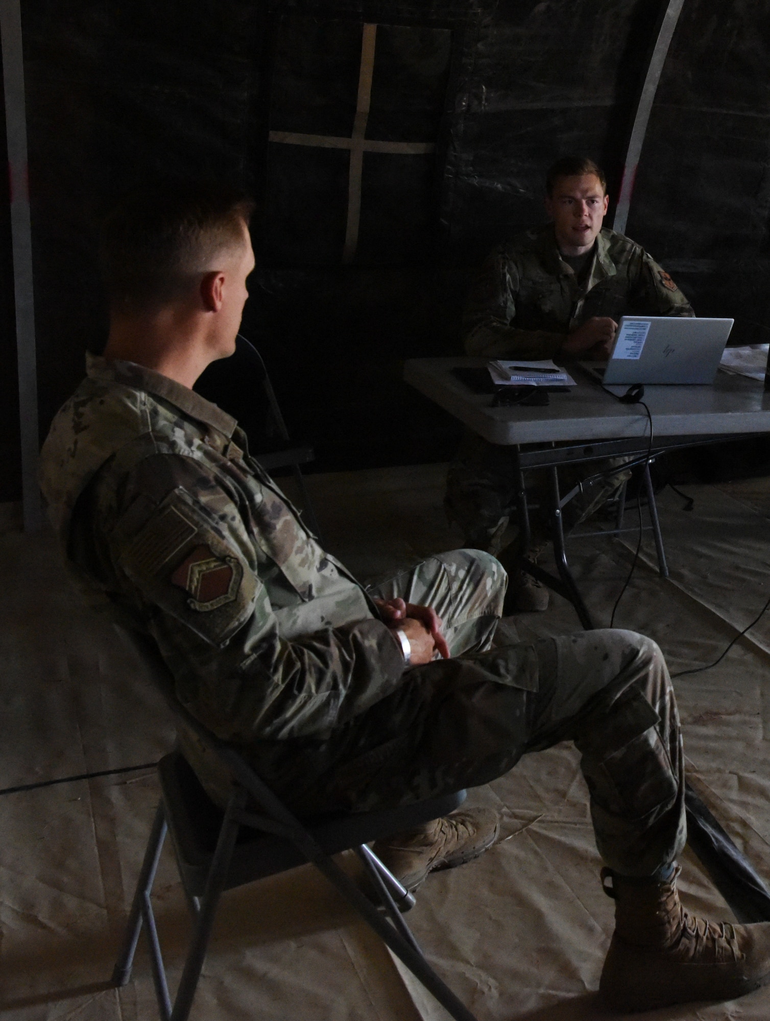 Second Lt. Mitchell Wilcox, right, 56th Contracting Squadron contracting specialist, briefs Col. Ryan Richardson, 56th Mission Support Group commander, during a Contingency Contracting Officer exercise June 9, 2021, at Luke Air Force Base, Arizona.